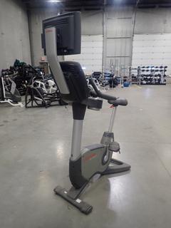 Life Fitness 95C Lifecycle Upright Exercise Bike w/ 15in LCD Monitor. SN ALX103724 *Note: This Item Is Located At 7103 68AVE NW- Location 2*