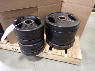 Qty Of (6) 10lb And (6) 25lb Weight Plates *Note: This Item Is Located At 7103 68AVE NW- Location 2*