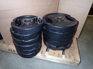 Qty Of (6) 10lb And (6) 25lb Weight Plates *Note: This Item Is Located At 7103 68AVE NW- Location 2*