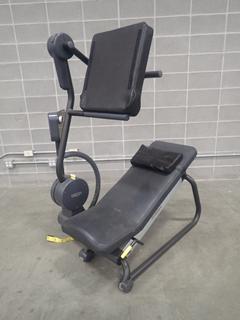 Technogym Flexability Posterior Machine  *Note: This Item Is Located At 7103 68AVE NW- Location 2*