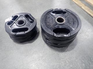 Qty Of (4) IGX 25lb Weight Plates And (4) Jade 10lb Weight Plates