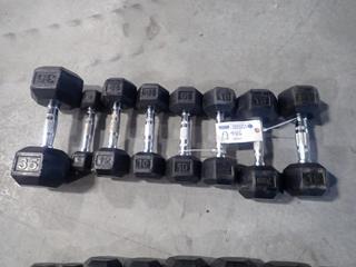 (2) 15lb, (3) 10lb, (1) 5lb, (1) 12lb, And (1) 35lb York Hex Dumbbells