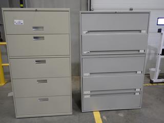 (2) 5-Drawer Filing Cabinets. *Note: Has Some Dents, This Item Is Located At 7103 68AVE NW- Location 2*