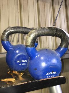 (2) 12Kg Kettle Bells.