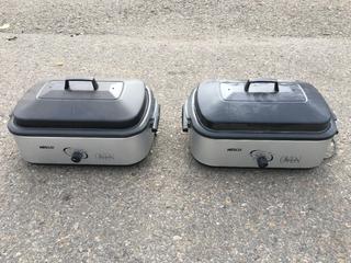 (2) Crock Pots.