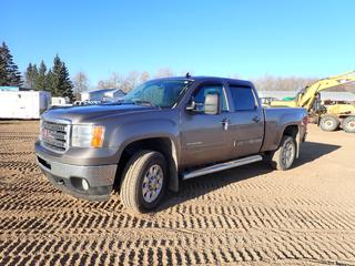 2012 GMC 2500HD 4X4 Crew Cab Pickup C/w 6.0L, V8, A/T, 6.5ft Box, Wood Box Liner, Power Windows, Power Locks, Heated Leather Seats, Tow Package, Towing Mirrors, (2) Key FOBS And Back Up Camera. Showing 191,539kms. VIN 1GT121EG0CF139234 *Note: Cracked Windshield, Rust On Hood, Missing Driver Door Bump Guard, Rust On Rear Fenders* 
