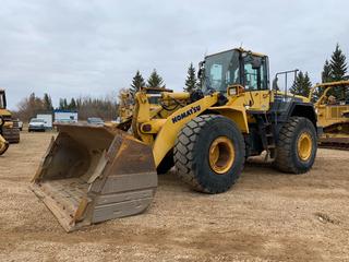 2007 Komatsu WA450-6 Wheel Loader C/w 124in GP Bucket w/ Hard Surfacing And Side Guards, 26.5R25 Tires @ 50%, Load Rite 2180 Scale w/ Load Rite LP590 Printer, AC Cab, Ride Control, Auto Lube, Full Fenders, Additional Counter Weights. Showing 19,340hrs. SN 85017 *Note: Fuel Gauge Intermittent*
