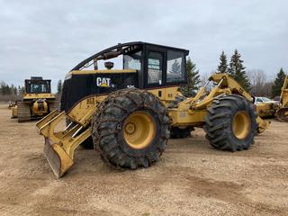 1995 Caterpillar 525 Grapple Skidder C/w Decking Blade, Cab, 30.5L-32 Tires, (1) Set Of Chains, Front @70% Rears @90%, Dual Arch Grapple, Cat Data Link. Showing 13,960hrs. SN 1DN00331