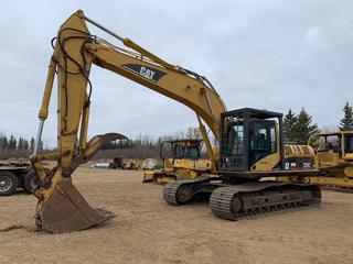 2006 Caterpillar 325C L Hydraulic Excavator C/w  42in Q/C Dig Bucket, Hyd Thumb, Aux Hyd, 10ft8in Stick, 31.5in TBG Pads w/ Corks, WBM FOPS, AC Cab, U/C 50%. Showing 11,528hrs. SN BMM00936 *Note: Damage To Rear Panel, (1) Bent Carrier Roller*