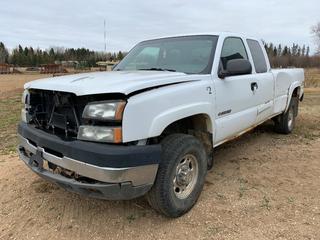 2002 Chevrolet 2500HD LS 4X4 Extended Cab Pickup C/w 6.0L, V8, A/T, AC, 8ft Box, Wood Box Liner, Power Windows, Power Locks, Key FOB. Showing 259,555kms. VIN 1GCHK29U13E174164 *Note: Runs Rough, Needs Boost, Requires Repair, Passenger Door Dented And Rusty, Grille In Box*