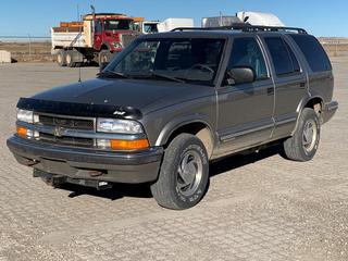 1999 Chev Blazer 4x4 SUV c/w 4.3L V6 Gas, Auto, A/C, Sunroof, Heated Seats, Two Hitch Receiver, Showing 209,825 Kms, VIN 1GNDT13W8X2146201. Requires Repair.