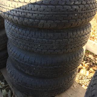 (4) Goodyear Marathon Radial Tires ST205/75 R15 w/ Rims.