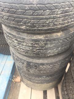 (5) Uniroyal Tires P215/75 R14 w/ Rims.