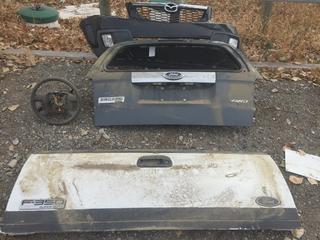 Ford Super Duty Tailgate & Infiniti Grill.