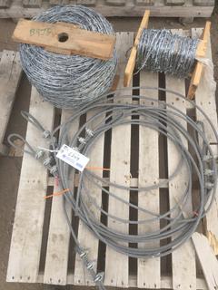 (1) Roll of Barb Wire, (1) Partial Roll of Barb Wire & Length of 5/16" Cable.