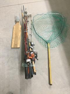 Quantity of Fishing Rods, Reels, Fish Net, & Fish Cleaning Board.