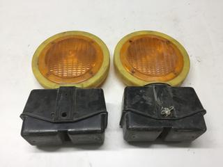 (2) Tranzlite Amber Roadside Blinking Lights, Requires (2) 6 Volt Lantern Batteries.