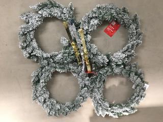 (4) 26" Flocked Wreaths and (3) Wreath Hangers with Bells.