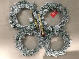 (4) 26" Flocked Wreaths and (3) Wreath Hangers with Bells.