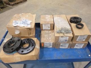 (9) Boxes of 2 In. Flanges, Gaskets, Studs and Nuts, (5) Boxes of 2 1/2 In. Flanges, Gaskets, Studs and Nuts (L-2-2)