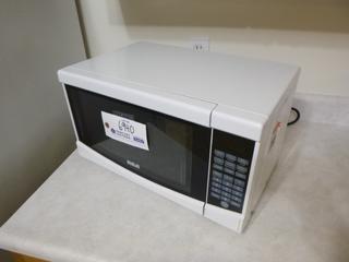 RCA Microwave, Model RMW733-WHITE *Located Offsite at 5013 48 St, Stony Plain, For Viewing and More Information Contact Al at 587-982-5353, Must Have Paid In Full Invoice For Removal, No Payments Accepted On Site*