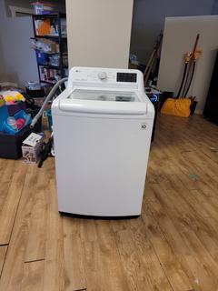 LG Washing Machine, Model WT7100CW *Located Offsite at 5013 48 St, Stony Plain, For Viewing and More Information Contact Al at 587-982-5353, Must Have Paid In Full Invoice For Removal, No Payments Accepted On Site* **Buyer Responsible For Loadout**