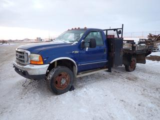 1999 Ford F-450 Super Duty Single Cab 4X4 Flat Deck c/w 6.8L Triton V10, 5 Speed Manual, Showing 304,914 Kms, Manual Hub, Headache Rack, Storage Cabinet, 245/70R195 Tires at 15%, 7 Ft. x 7 Ft. 6 In., VIN 1FDXF47S3XEB30147 *Note: Damage to Drive Shaft, Does Not Start, Running Condition Unknown*