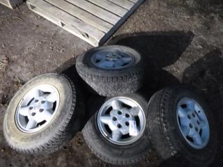 (4) Bridgestone Blizzak 225/75R15 Tires w/ Rims