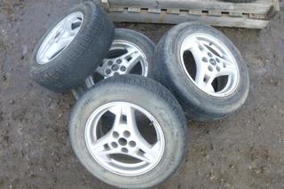 (2) Firestone M+S 195/65R15 Tires on Pontiac Rims, 2- Tires at 50%, 2- Tires at 20%