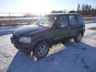 2000 Honda CRV AWD c/w 2.0L, A/T, A/C, Showing 404,031 Kms, P205/70R15 Tires at 20%, Rears at 30%, VIN JHLRD1857YC800566 *Note: Engine Light On, ABS Light On, Boost to Start, Runs Rough, Flat Tires, Rust*