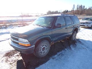 1998 Chevrolet Blazer 4X4  c/w 4.3L V6 Vortec, A/T, A/C, Showing 244,707 Kms, 235/75R15 Tires at 40%, VIN 1GNDT13W4W2189013 *Note: Boost to Start, Flat Tires, Damage and Rust*