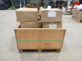 Pallet Containing Qty of Komatsu and Cat Quick Fit Kits (Y41)
