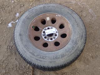 (1) Bridgestone Dueler A/T P265/70R17 Tire w/ Rim