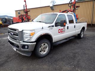 2015 Ford F250 Super Duty XLT Crew Cab Pickup Truck C/w 6.2L Gas Engine, 8-Cylinder, A/T, 4X4, IOR Aluminum Headache Rack w/ Flasher, Rearview Mirror Backup Camera And 275/70R18 Tires. Showing 191,231kms. VIN 1FT7W2B63FEC29021