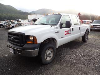 2006 Ford F350 Super Duty XL Crew Cab Pickup Truck C/w A/T, 4x4, 6L Power Stroke Turbo Diesel Engine, IOR Aluminum Headache Rack w/ Flasher, Regal 750L Fuel Tank w/ Fill- Rite Pump And Hose Reel, Kenwood CB Radio And Curt Discovery Brake Controller. Showing 235,384kms. VIN 1FTWW31P57EA00790