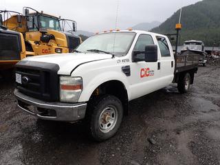 2008 Ford F350 Super Duty XL Crew Cab, 4x4 Flat Deck Truck C/w 5.4L Gas Engine, 8-Cylinder, 9ft5in Ventures MFG. Steel Deck And Box, Sn 080439631, Headache Rack, Flasher, Kenwood CB Radio And Led Deck Lights. Showing 95,737kms. VIN 1FDSW35548ED68169