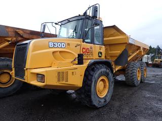 2002 Bell B30D (John Deere) 6x6 Articulated Dump Truck C/w  6.4L Daimler Chrysler Engine, Auto Transmission, Axle Model 16R8F, ROPS, Icom CB Radio, Delco Electronics Radio, 27,723KG Payload And 750/65 R25 Fronts, 23.5R25 Rears, Tires @ 20%. Showing 5750hrs, 19,866kms. VIN AEB4118322R000171 *Note: Mismatched Fronts, Cracked Glass On Cab Side*