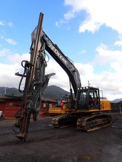 2010 John Deere 350d LC Excavator Carrier For Traxxon Rock Drill C/w Accurate Thumb, 28in Pads, TR-EX 2000 High Performance Rock Drill Attachment, ROPS, A/C Cab, U/C 70%, Am/Fm Radio And Guards. Showing 3513hrs. SN 1FF350DXLA0806920 *Note: Pins Slightly Worn*