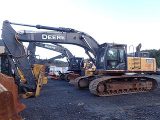 2011 John Deere 470G LC Excavator C/w ROPS Model 4704428C, 35 1/2in Triple Grouser Pads, Light Package, Brush Guards, Brandt Thumb And U/C 50%. Showing 9588hrs. SN 1FF470GXPBE470062