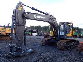 2014 Volvo ECR305CL Excavator C/w 31 1/2in Triple Grouser Pads, Brush Guard, Light Package, Plumbed, Rear Camera, Quick Attach, Accurate Thumb, Volvo Radio/CD Player, Accurate Fabricating Cab Guard, Sn 1504-262510, Catwalk Railing And U/C 90%. Showing 7664hrs. SN VCECR305KE0110488