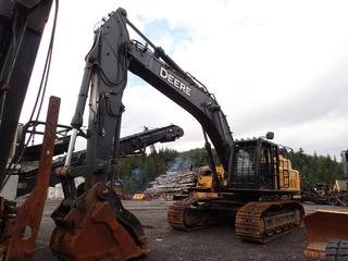 2010 John Deere 450D LC Excavator C/w 30in Double Grouser Pads, Brush Guard, Light Package, A/C Cab, Quick Attach, 46 1/2in Dig Bucket, Accurate Thumb, SN 1304-2140502, And Radio. Showing 9185hrs. SN FF450DX913925