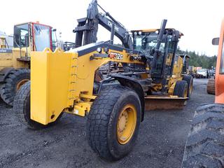 2014 John Deere 772G Motor Grader C/w JD 6090HDW01 Engine, Sn RG6090L119786, 12ft Moldboard, Light Package, 8-speed, Flasher, Kenwood CB Radio And 17.5R25 Tires. Showing 9673hrs, 62,590 Miles. SN 1DW772GXHED660743 *Note: Flat Tire*