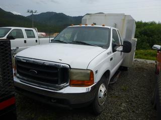 1999 Ford F350 Super Duty Extended Cab Pickup Truck C/w Powerstroke V8 Diesel Engine, 8-Cylinder, A/T, 4X4, Dual Rear Wheels And 9ft Rear Steel Work Box. Showing 293,860kms. VIN 1FDWX37F6XEB85648