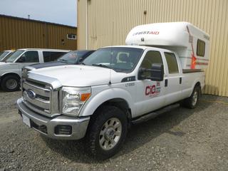 2015 Ford F250 Super Duty Crew Cab Pick Up Truck C/w 6.2L Gas Engine, 8-Cylinder, A/T, 4x4, 8ft Box, Icom Radio, Tuff Port Model MTC/ETV Mobile Treatment Center, Fiberglass Insert w/ First Aid Equipment And 35/12.5 60R20 Tires @ 70%. Showing 64,802kms. VIN 1FT7W2B68FEB26869