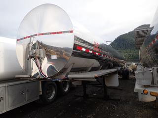 1996 T/A 40ft Beall Stainless Steel Tanker Trailer C/w 6,700 Gallon Capacity, (Water), 65,000 GVWR, SS, Air Bag Suspension, ABS, 295/75R22.5 Tires And Aluminum Rims. VIN 1BN2T4326TM961117