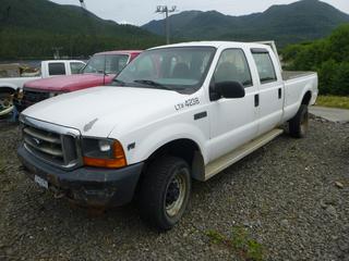 2001 Ford F350 Super Duty XL Crew Cab Pickup Truck C/w Triton V8 Engine, 8-Cylinder, Standard Transmission And Aluminum Headache Rack. Showing 201,598kms. VIN 1FTSW31L01EC74238 *Note: Has Damage To Exterior*