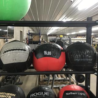 (3) Medicine Balls, 14lb, 16lb & Unknown Weight.