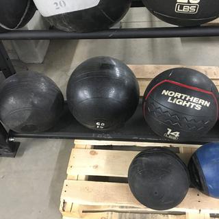 (3) Medicine Balls, 14lb, 60lb & Unknown Weight.