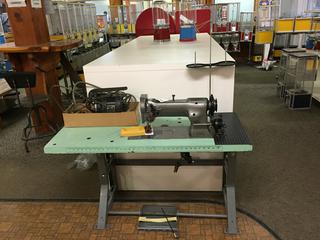 Consew Sewing Machine. 47 1/2" x 53 1/2". Working Condition. Manual, Extra Bobbins, & Needles in Office.