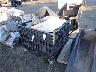 Plastic Crate with Electrical Conduit Connections, Bolts and Gas Connections.